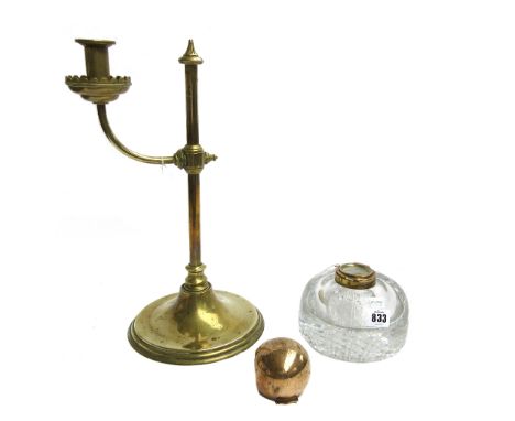A Victorian glass and brass mounted capstan inkwell, of circular form, with engraved monogram to the lid, 15cm diameter, and 