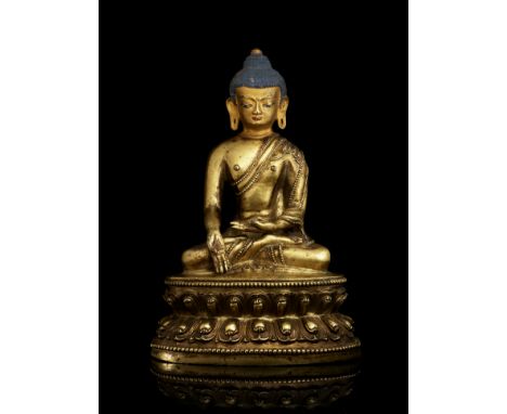 STATUE DE RATNASAMBHAVA EN ALLIAGE DE CUIVRE DORÉTIBET, XIV/XVE SIÈCLEHimalayan Art Resources item no. 4851 19 cm (7 1/2 in.)