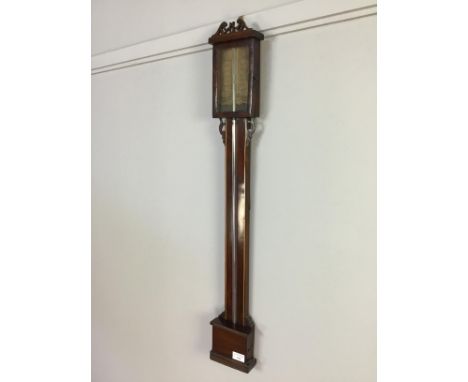 REGENCY MAHOGANY STICK BAROMETER, with fretted swan neck pediment above a paper dial, outlined in boxwood, 94cm high