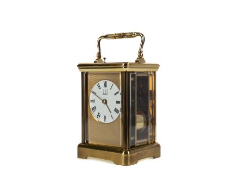20TH CENTURY DUNHILL BRASS REPEATER CARRIAGE CLOCK, the white enamel dial with numerals in black and inscribed Dunhill, 14cm 
