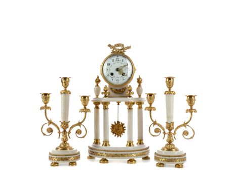 ORMOLU AND ALABASTER CLOCK GARNITURE, comprising clock and two three branch candlabrum, the clock with two train eight day mo