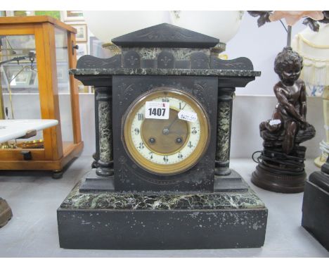 A XIX Century Black Slate Mantle Clock, with circular dial, column supports, plinth base.