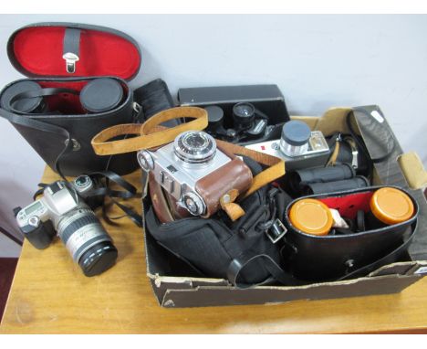 Zeiss Ikon Prontor SVS Camera, Pentax MZ-7 camera, Mark Scheffel zoom 10 x 30-50 binoculars, other binoculars etc:- One Box.