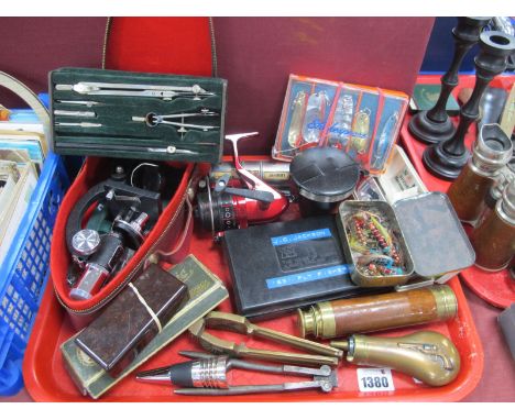 Ace 300 Fishing Reel, harmonica, microscope, fly fishing hooks,nut crackers:- One Tray