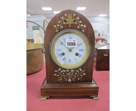 Early XX Century Mahogany Arch Cased Mantel Clock, inlaid with brass mother of pearl and nacre, eight day movement, Roman num