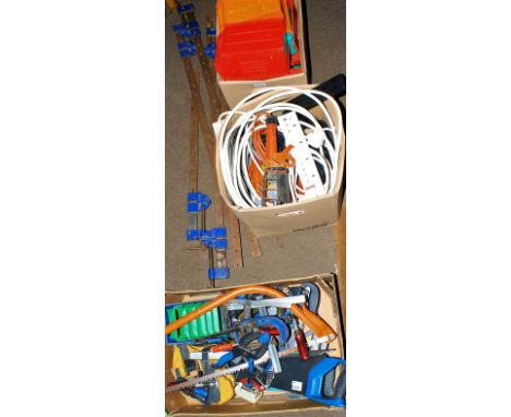 An assortment of hand tools. Together with storage containers, six sash clamps, etc.