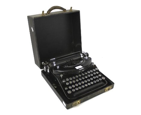 A 20th century Underwood Portable typewriter. In original case