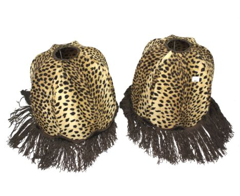 A pair of retro 1960s Biba lamp shades. In a leopard print upholstery, with fringe, approximately 35cm high
