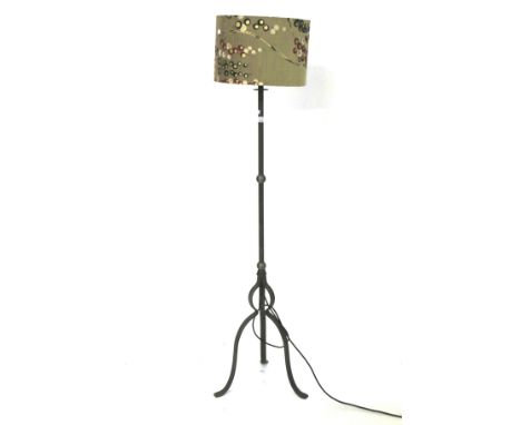 A contemporary standard lamp. The metal frame with a tripod base, together with a colourful shade, H128cm (excluding fitting)