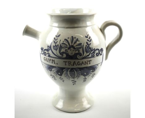 A late 19th century 'Gumm Tragant' ceramic pot. With single handle to one side and spout to other, approximately H25cm 