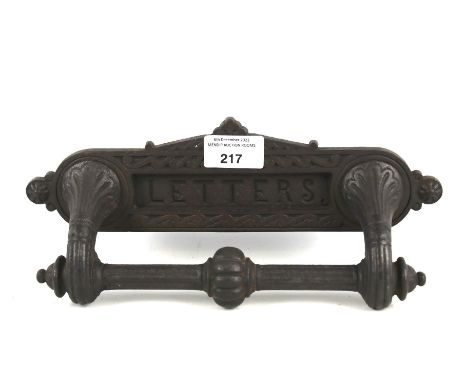 A Victorian cast metal letterbox plate and knocker. With moulded details, the flap marked 'Letters', L28cm