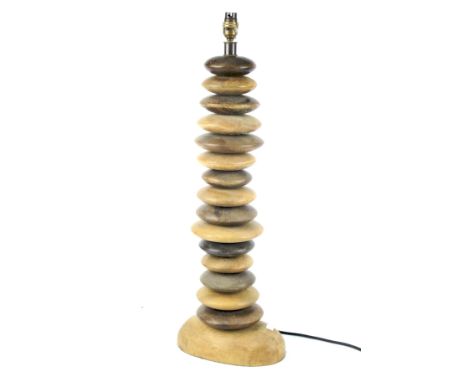 A contemporary wooden 'Pebble' table lamp. Featuring interlocked turned wooden discs, H62cm (excluding fitting)