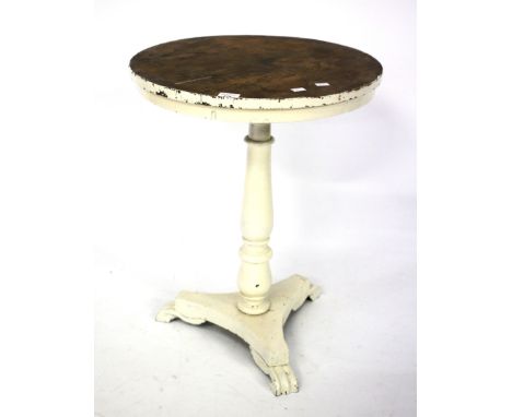 An early 20th century white painted side table. Of circular form, raised upon tripod supports, 54cm diam x H68cm