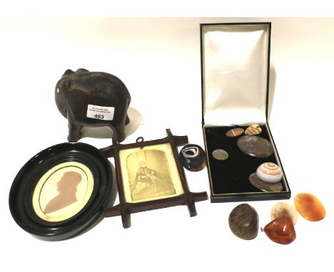 An assortment of collectables. Comprising a carved wooden elephant, Victorian photograph, selection of stones and minerals an