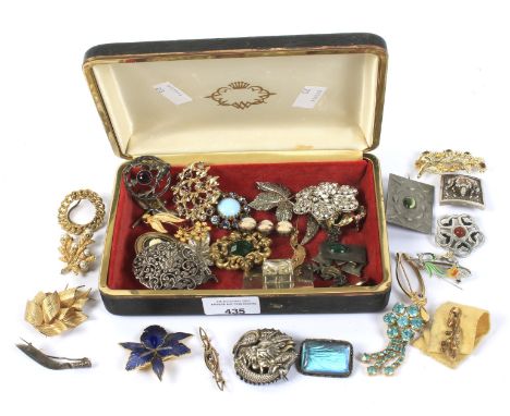 A box of 19th century and later brooches. Including a early 20th century butterfly wing brooch, a silver dagger brooch, Asian