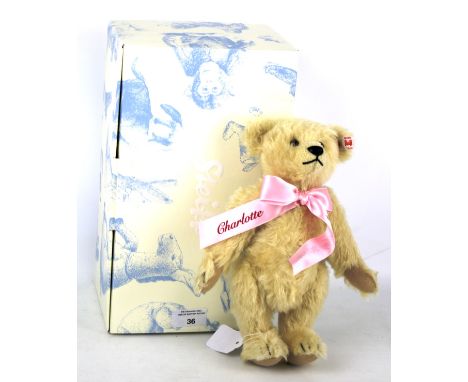 A boxed Steiff 'Royal Baby' bear. Celebrating the birth of Princess Charlotte, No 664922, golden mohair, articulated limbs an