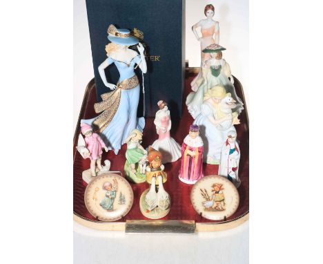 Four Royal Worcester figures including Peace and Springtime, Coalport Goose Girl and two others, two candle snuffers, and thr