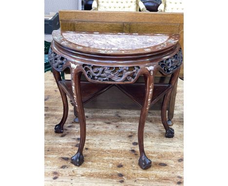 Oriental hardwood and mother of pearl inlaid demi-lune table with marble inset top on ball and claw legs, 81cm by 83.5cm by 4