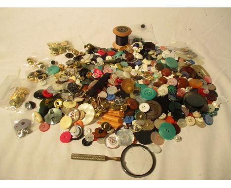 A collection of various vintage buttons etc.