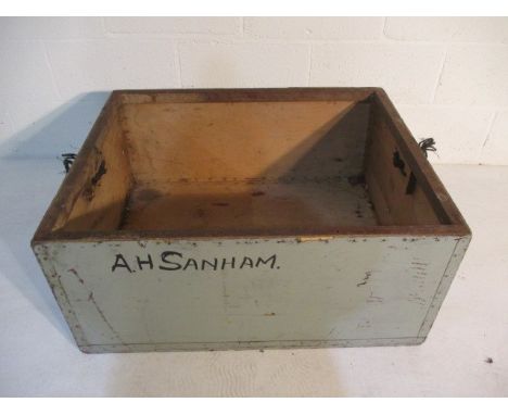 A wooden storage trunk - no top