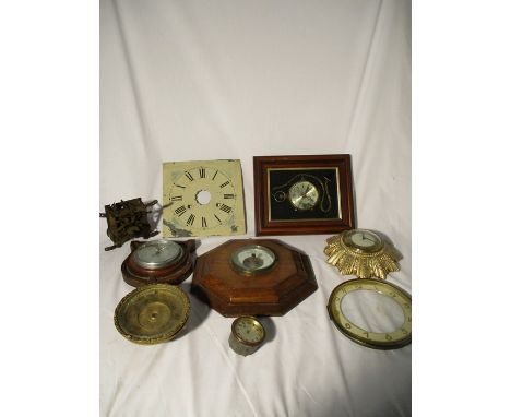 A collection of Clock parts and Barometers.
