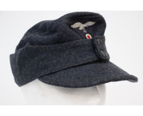 WW2 Third Reich Luftwaffe Einheitsfeldmmutze M43 cap. Two button front. Rayon lined. RB numbered 0/0501/0015 and dated 1944. 