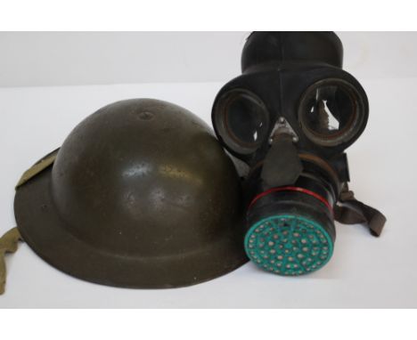 WW2 British Special Service Respirator. Dated 1939 to straps and 1937 to filter. And a Belgian Army steel helmet. (British Mk