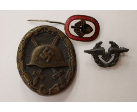 WW2 Third Reich 1939 Black Wound Badge, early Tombak example, finish worn: RAD enamel stick pin: DLV lapel badge.