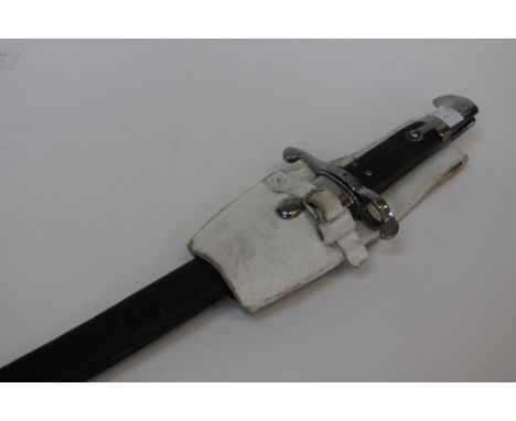 British Army Whitworth 1863 pattern bayonet and scabbard. Plated fittings. 58cm blade. With white leather frog.