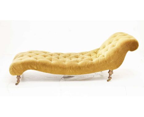 Late 19th/early 20th century chaise longue/day bed with deep button golden velvet upholstery, on turned wooden supports, rais