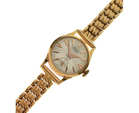 Augustus - Lady's 18k gold cocktail watch, the silvered dial with gilt hour markers, seconds subsidiary and dauphine hands, s