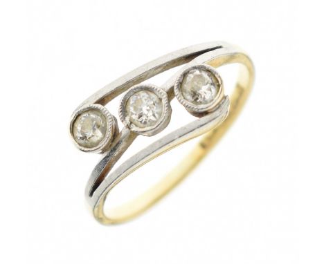 Diamond three-stone crossover ring, the yellow metal shank stamped '18ct &amp; Plat', size K approx, 2.3g gross approx