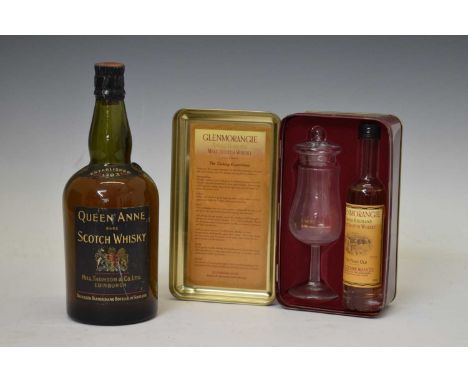 Glenmorangie whisky tin with glass, together with a Beswick Kestrel Beneagles whisky and Queen Anne Scotch Whisky (3)