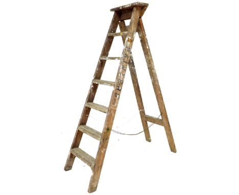 A vintage wooden step ladder, 47 by 11 by 165cm high. 