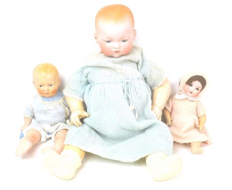 Two Armand Marseilles bisque headed dolls,  both with sleepy eyes, the larger doll with closed mouth, 62cm long, the smaller 