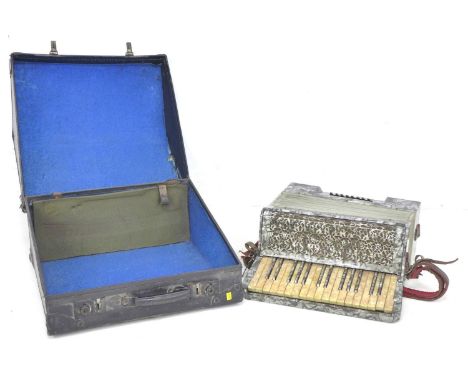 An Alvari piano accordion with mother of pearl effect case, 39.5 by 39 by 21 high, in fitted carry case, 50 by 45 by 24.5cm h