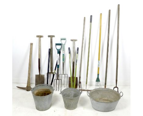 A collection of garden tools and three aluminium containers, including two buckets and a twin handled basin, hoes, rake, spad