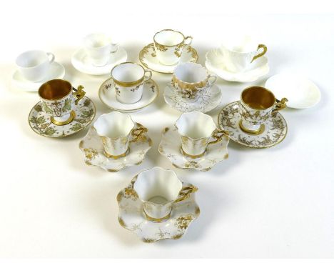 A group of eleven coffee cups and saucers, together with a single white saucer. (12) 