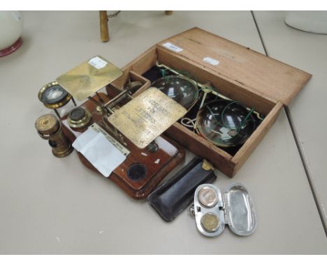 A vintage set of brass postal scales and other miscellaneous including jewellery scales, microscope lenses and sovereign hold