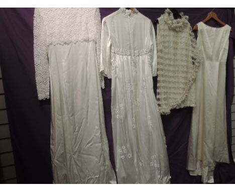 Four vintage wedding dresses, all around 1960s. Good condition and a variety of styles.small to medium sizes.
