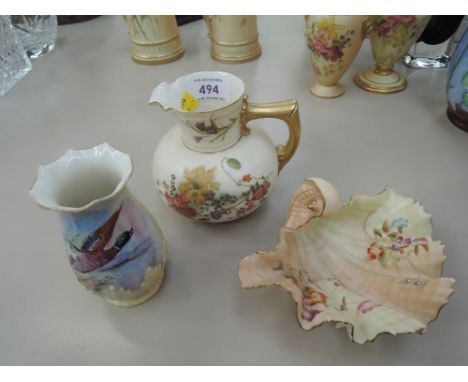 A Royal Worcester jug having gilt heightened floral decoration, and a Royal Worcester shell dish and a Locke & Co Worcester v