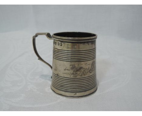 A Georgian silver miniature tankard having reeded decoration to body, monogram to front and architectural handle, London 1819