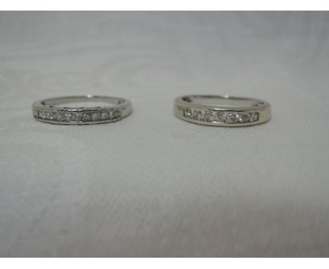 Two lady's half eternity rings having channel set diamond chips in 9ct white gold loops, size K/L 
