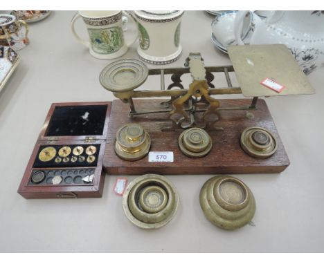 A set of vintage postal scales, brass weight and jewellery scale weights