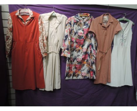 Five vintage 1960s and 1970s dresses,mixed styles with some lovely bright prints, Small to medium sizes. great condition.