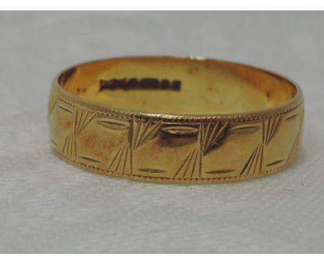 An 18ct gold wedding band, approx 3.9g &amp; size R