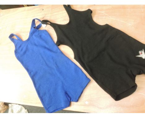 Two vintage 1940s wool swimsuits,one in black one in blue.good condition, small repair to one.