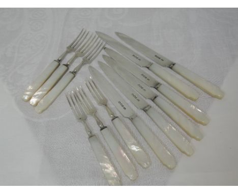 A set of six silver fruit knives and forks having mother of pearl handles, Sheffield 1936, Harrison Brothers &amp; Howson