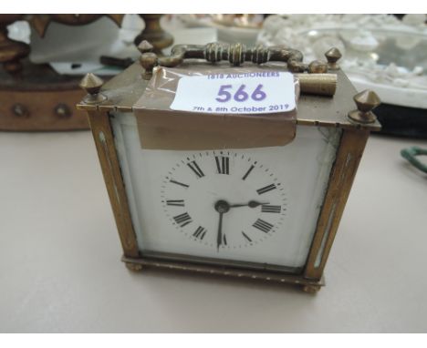 An early 20th century brass carriage clock of small design