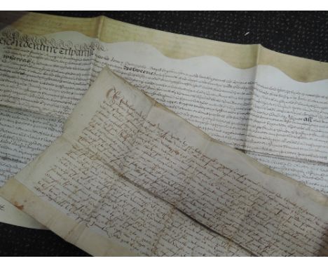 A 16th century vellum indenture manuscript document dated 1598 and another dated 1717